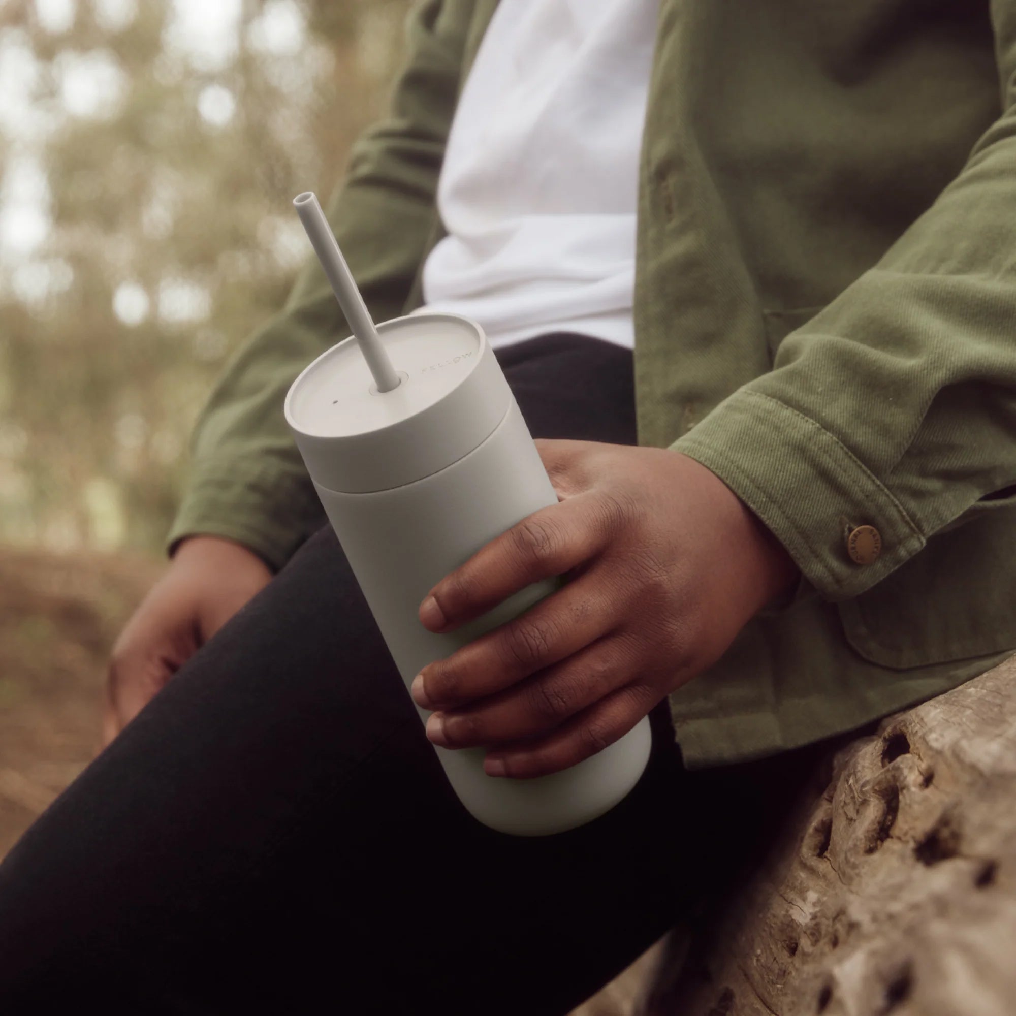 Fellow Carter Cold Tumbler in matte stainless steel with reusable straw, ceramic-coated interior, and spill-resistant lid. Available in 16 oz size.