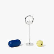 Areaware Abaco Bottle Opener with colorful wood beads on zinc alloy base, inspired by the abacus.