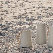 Stelton Emma Vacuum Coffee Jug in sand lacquered steel with beechwood handle. Thermal coffee jug keeps coffee hot for hours, 1.2 L. Designed by HolmbäckNordentoft.