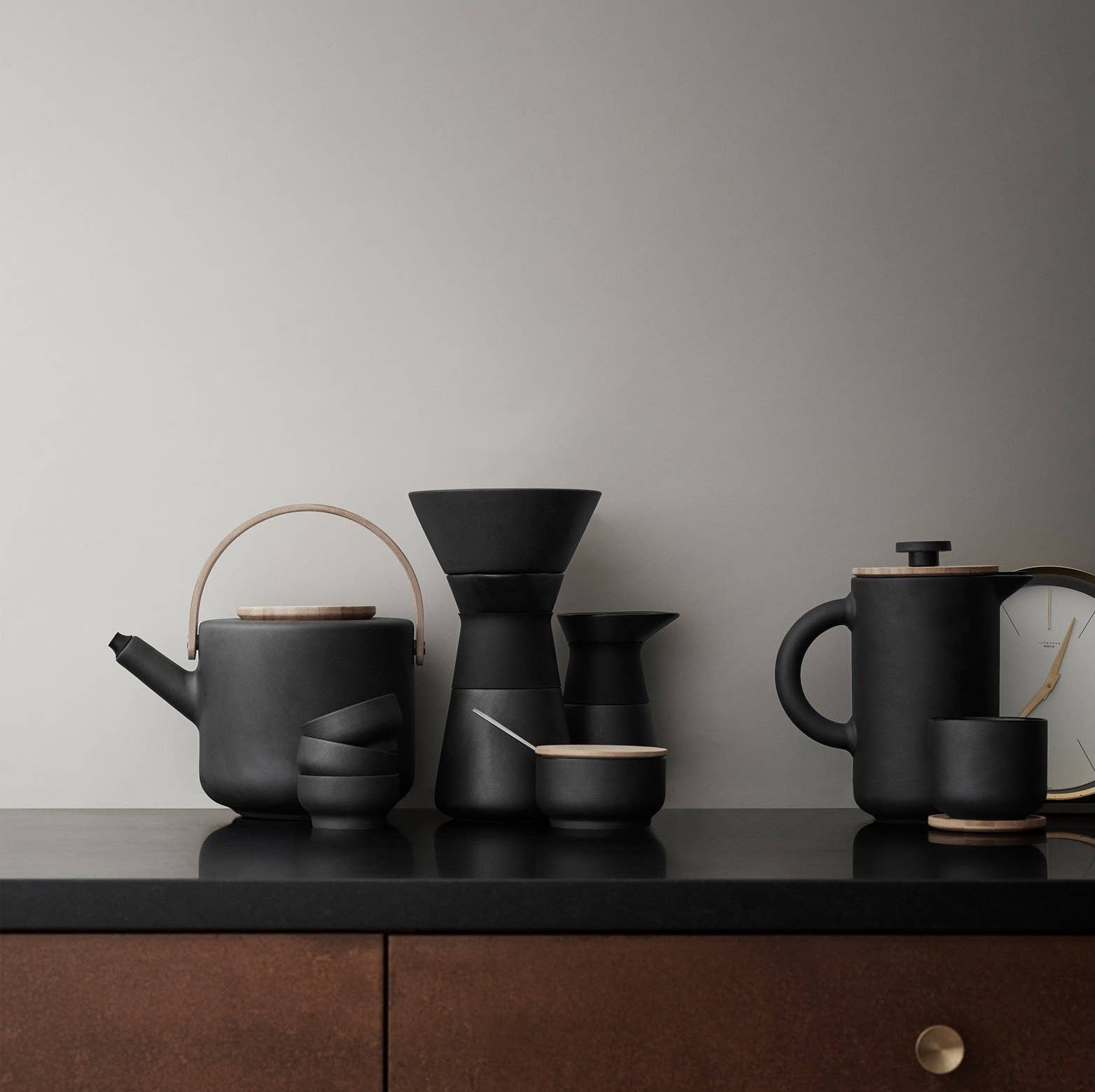 Stelton Theo set in matte black stoneware by Francis Cayouette with glossy interior glaze, rustic yet modern Nordic coffee maker, 0.8L capacity.