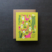 Badger & Burke Little Critters Card featuring whimsical illustrated animals and flowers in pink, green, and white on a lime green background with “Hello Little One!” text.