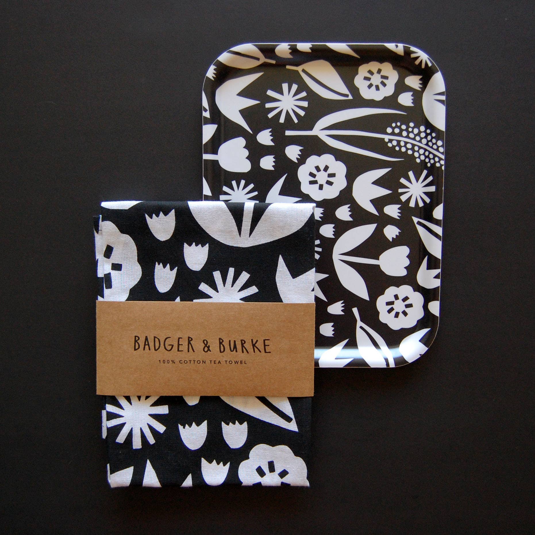 Badger & Birch June Birch Tray, 20 × 27 cm, black-and-white floral design in FSC-certified birch. Handmade in Sweden.