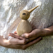 Architectmade BIRD by Kristian Vedel, handmade in oak with wenge and maple eyes, available in Small, Large, and Chubby sizes.