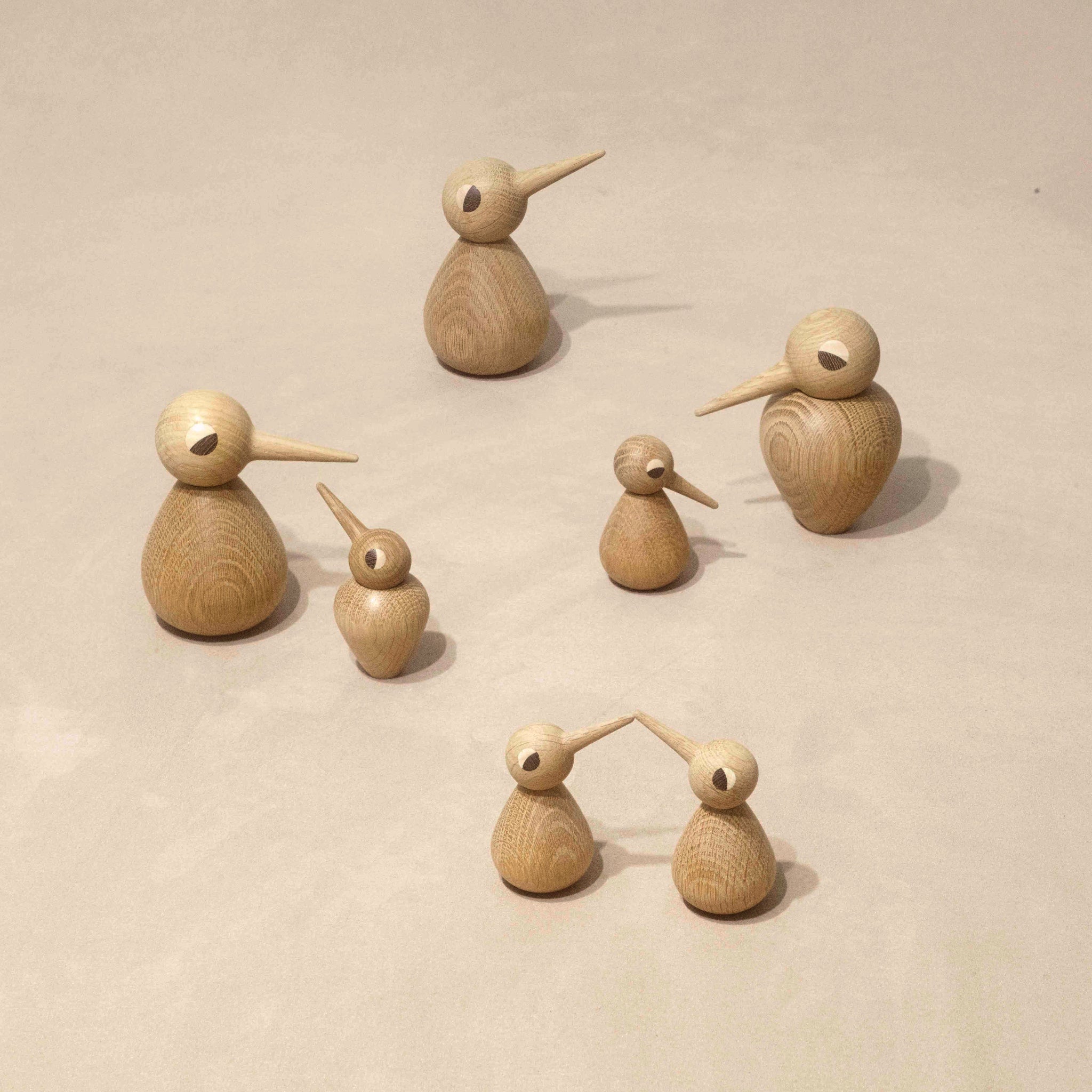 Architectmade BIRD by Kristian Vedel, handmade in oak with wenge and maple eyes, available in Small, Large, and Chubby sizes.