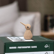 Architectmade BIRD by Kristian Vedel, handmade in oak with wenge and maple eyes, available in Small, Large, and Chubby sizes.