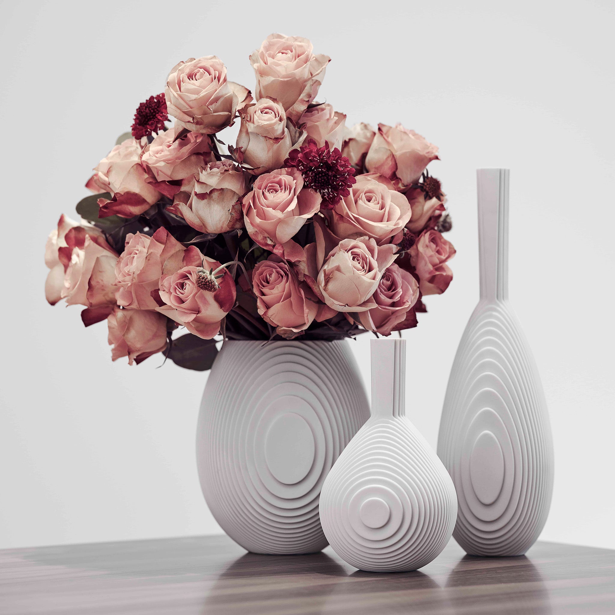 Architectmade Flow Vases in white porcelain, designed by Vibeke Rytter. Inspired by water ripples and Copenhagen’s Grundtvig’s Church.
