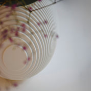 Architectmade Flow Vases in white porcelain, designed by Vibeke Rytter. Inspired by water ripples and Copenhagen’s Grundtvig’s Church.
