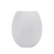 Architectmade Flow Vases in white porcelain, designed by Vibeke Rytter. Inspired by water ripples and Copenhagen’s Grundtvig’s Church.