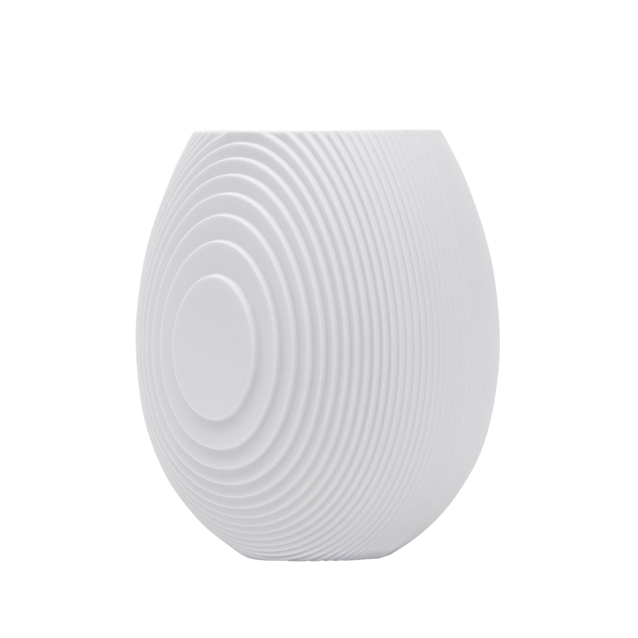 Architectmade Flow Vases in white porcelain, designed by Vibeke Rytter. Inspired by water ripples and Copenhagen’s Grundtvig’s Church.