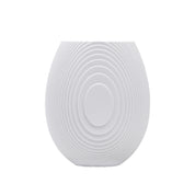 Architectmade Flow Vases in white porcelain, designed by Vibeke Rytter. Inspired by water ripples and Copenhagen’s Grundtvig’s Church.