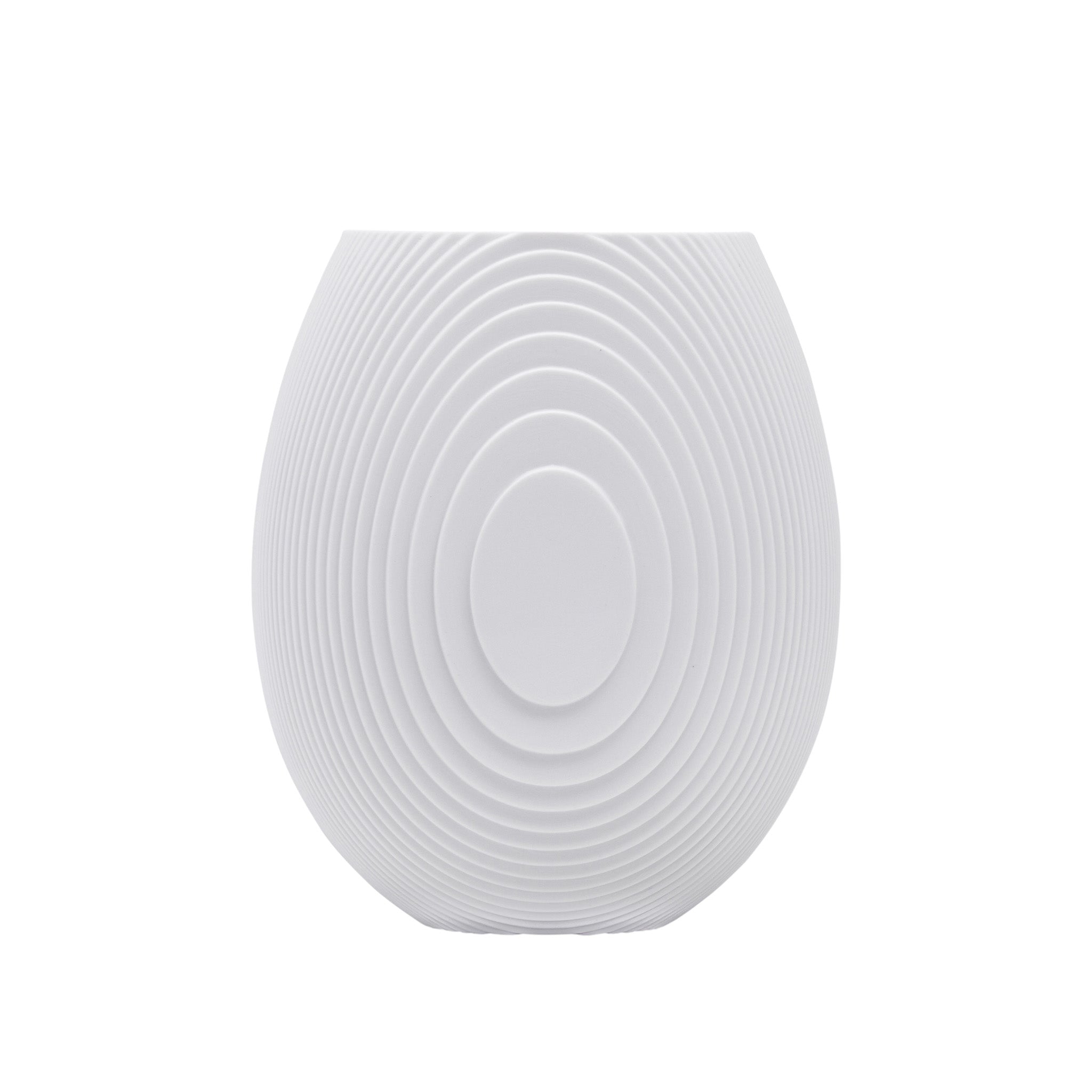 Architectmade Flow Vases in white porcelain, designed by Vibeke Rytter. Inspired by water ripples and Copenhagen’s Grundtvig’s Church.