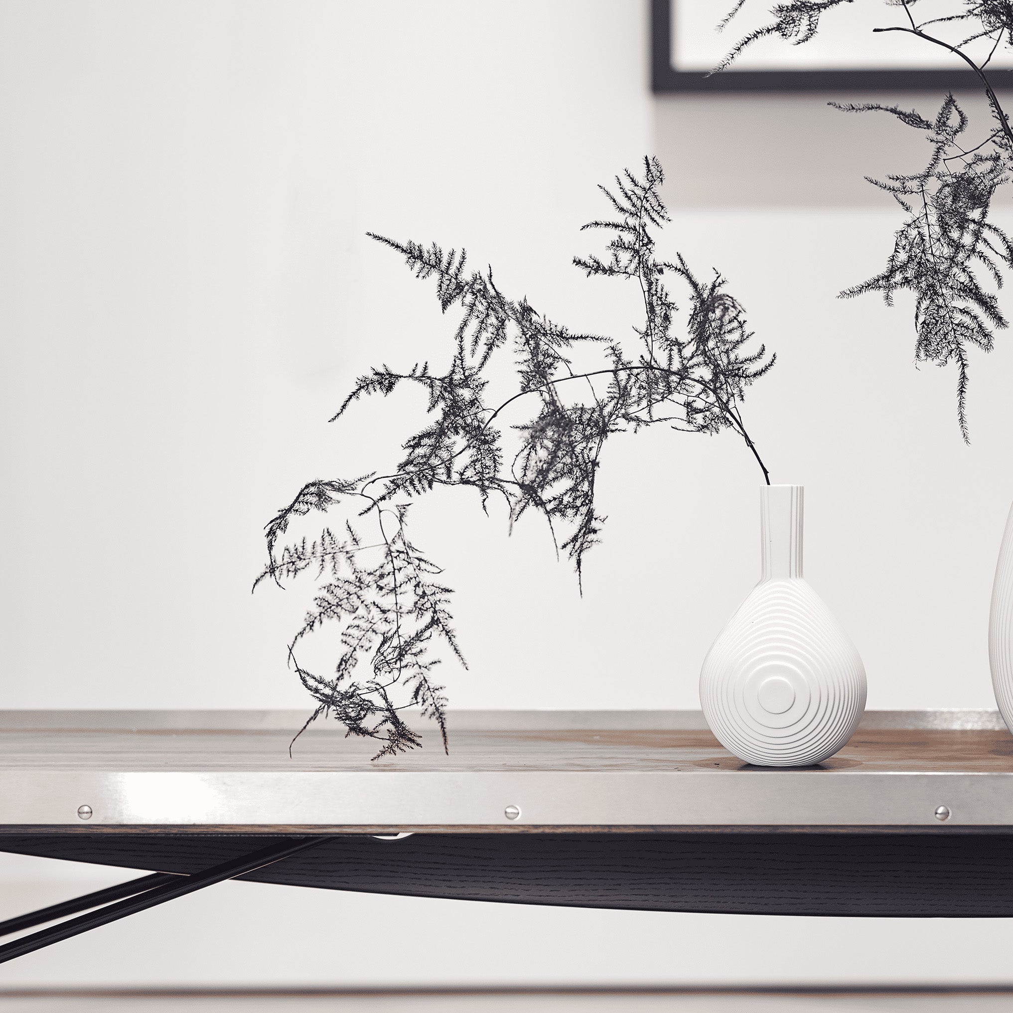 Architectmade Flow Vases in white porcelain, designed by Vibeke Rytter. Inspired by water ripples and Copenhagen’s Grundtvig’s Church.