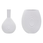 Architectmade Flow Vases in white porcelain, designed by Vibeke Rytter. Inspired by water ripples and Copenhagen’s Grundtvig’s Church.