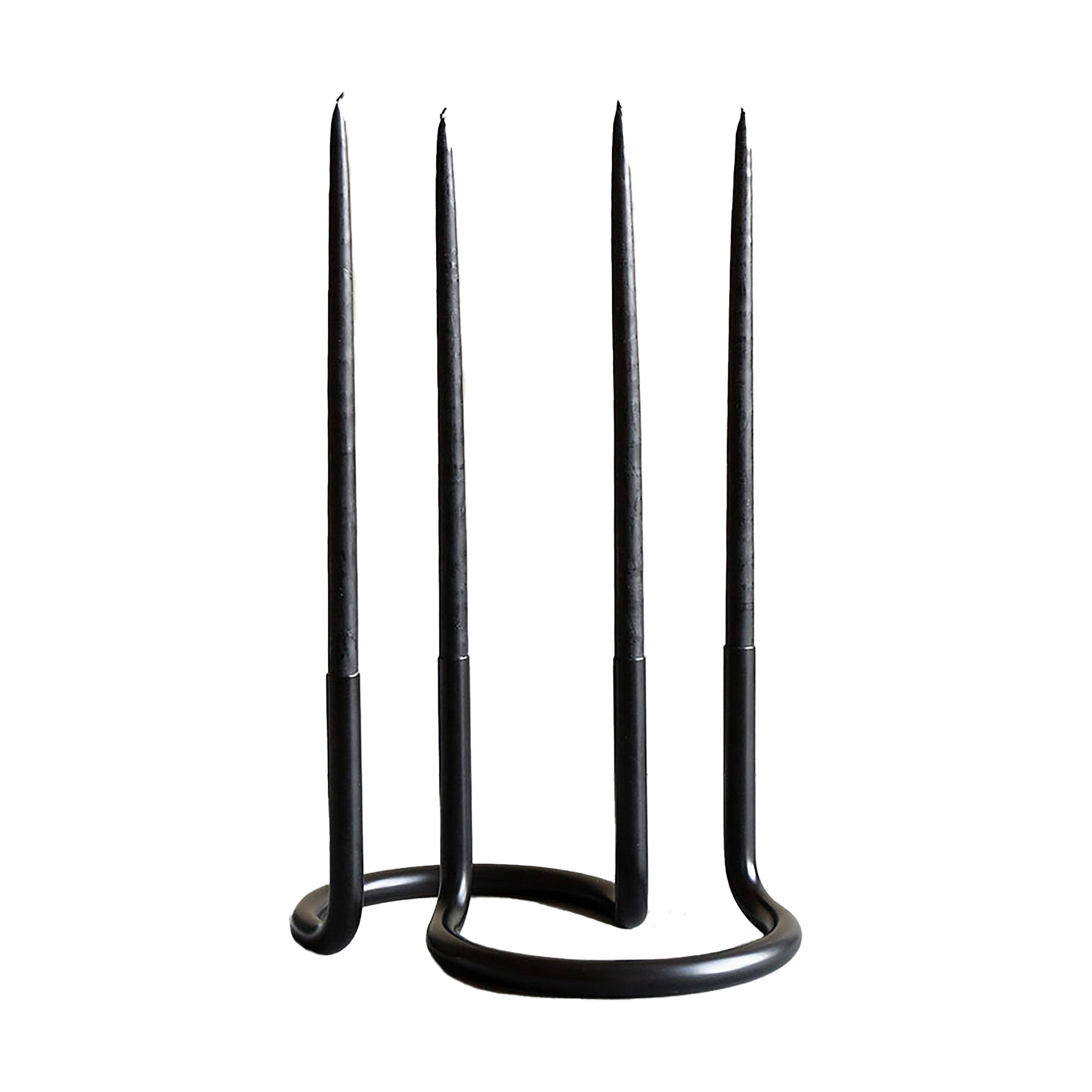 Pair of Architectmade Gemini candleholders interlocked in black and white, glowing with taper candles and bundle savings.