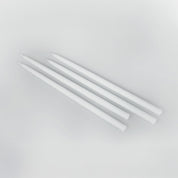 Architectmade white tapers for Gemini Candleholder by Peter Karpf in matte white stainless steel.