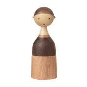 Architectmade Kin figurines by Lars Beller Fjetland, handmade in walnut, mahogany, and maple with tilting heads, shown in a mix-and-match constellation.