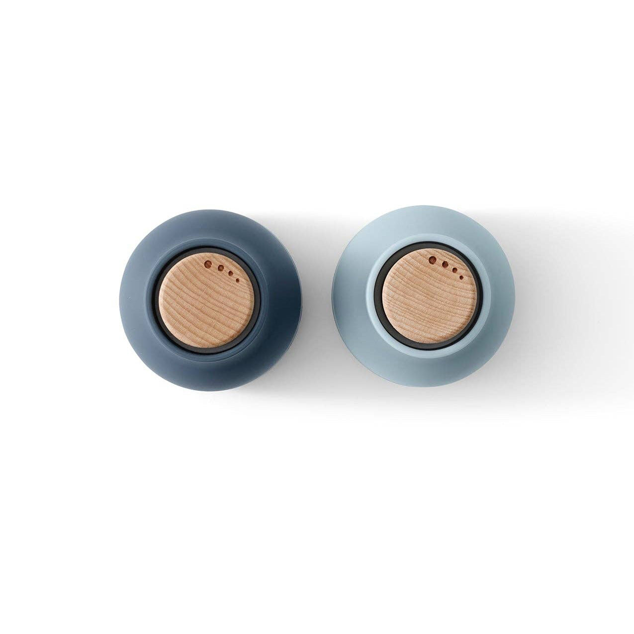 Audo Copenhagen Bottle Grinder in bottle-shaped form with beech lid. Nordic salt and pepper mill with inverted, mess-free design.