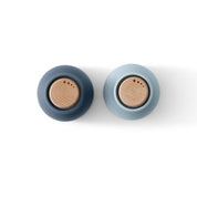 Audo Copenhagen Bottle Grinder in bottle-shaped form with beech lid. Nordic salt and pepper mill with inverted, mess-free design.