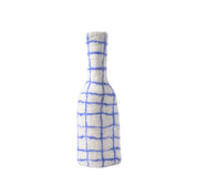 Aveva Design Bottle-Vase Cover in blue checked 100% wool, handmade in Nepal. Colorful felted sleeve that dresses up bottles or vases with cheeky Nordic flair.