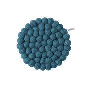 Aveva Design Round Wool Trivet, handmade wool circle design in multiple colors. Protects tables with playful style.