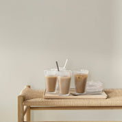 Stelton Pilastro Large Drinking Glass Set of 4 in clear machine-blown glass. Art Déco–style Nordic glasses for hot or cold drinks, stackable and sturdy.