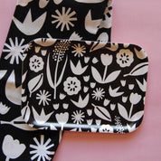 Badger & Birch June Birch Tray, 20 × 27 cm, black-and-white floral design in FSC-certified birch. Handmade in Sweden.