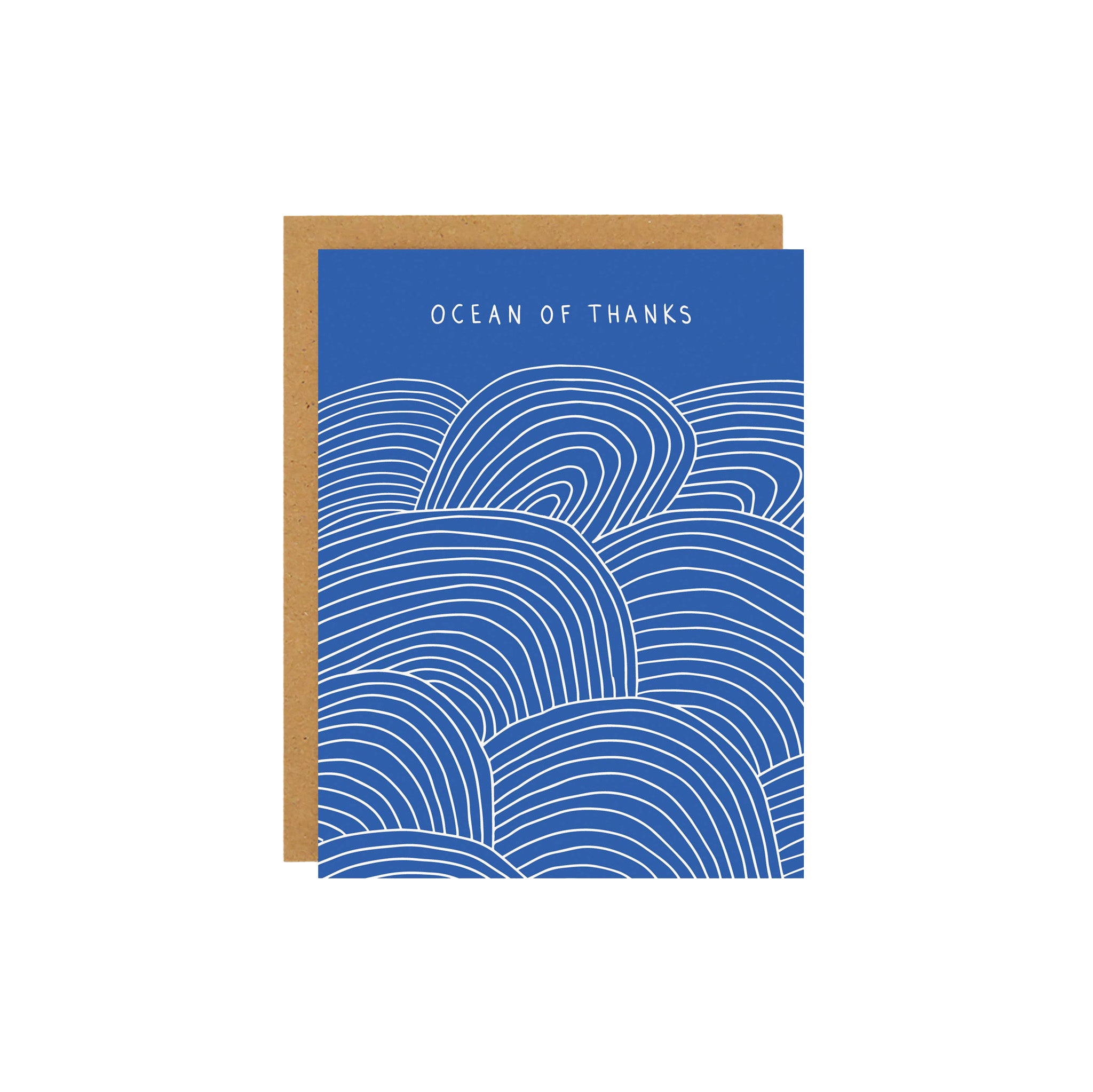 Badger & Burke Ocean of Thanks Card featuring hand-drawn white wave lines on a deep blue background with “Ocean of Thanks” text at the top.