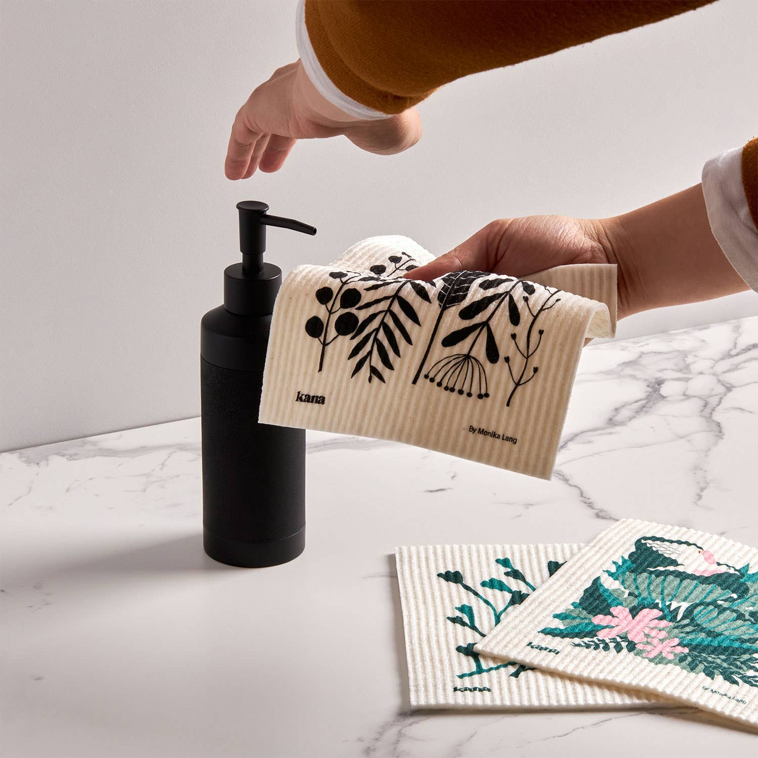 Kana Swedish Dishcloths, set of 9. Three organic flora + fauna designs by Monika Lang, compostable cellulose/cotton blend, made in Sweden.