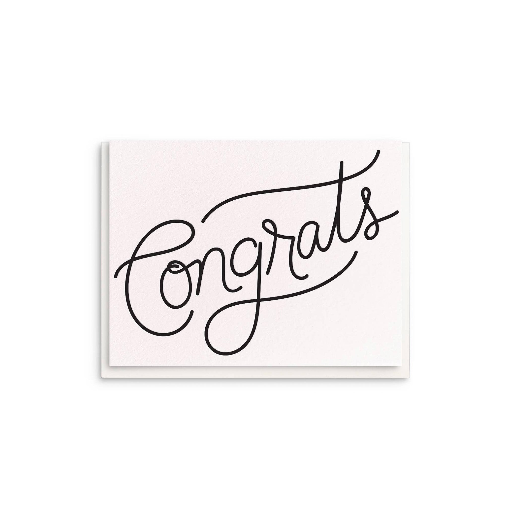 Dahlia Press Congrats Card with oversized hand-lettered “Congrats” in black script. Letterpress printed on cotton paper, blank inside, 4.25 × 5.5", envelope included.
