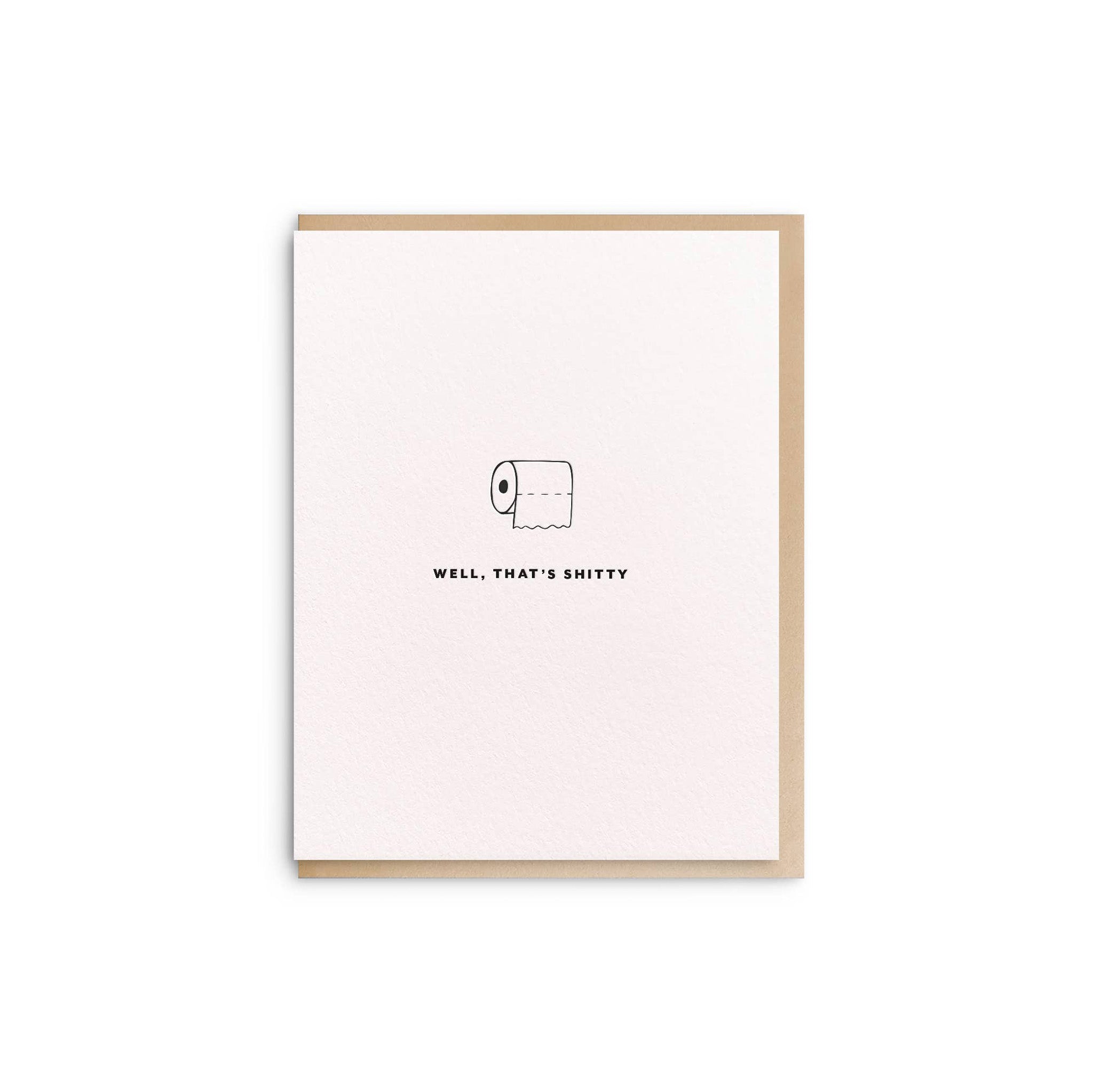 Dahlia Press That’s Shitty Card with minimalist toilet paper roll illustration and text “Well, That’s Shitty.” Letterpress printed on cotton paper, blank inside, 4.25 × 5.5", envelope included.