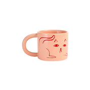 Donna Wilson candy-pink ceramic Cat Mug with debossed cat images, tactile coffee or tea mug.