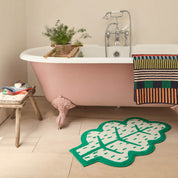 Donna Wilson Leaf-shaped cotton bath mat, quirky green bathroom rug.