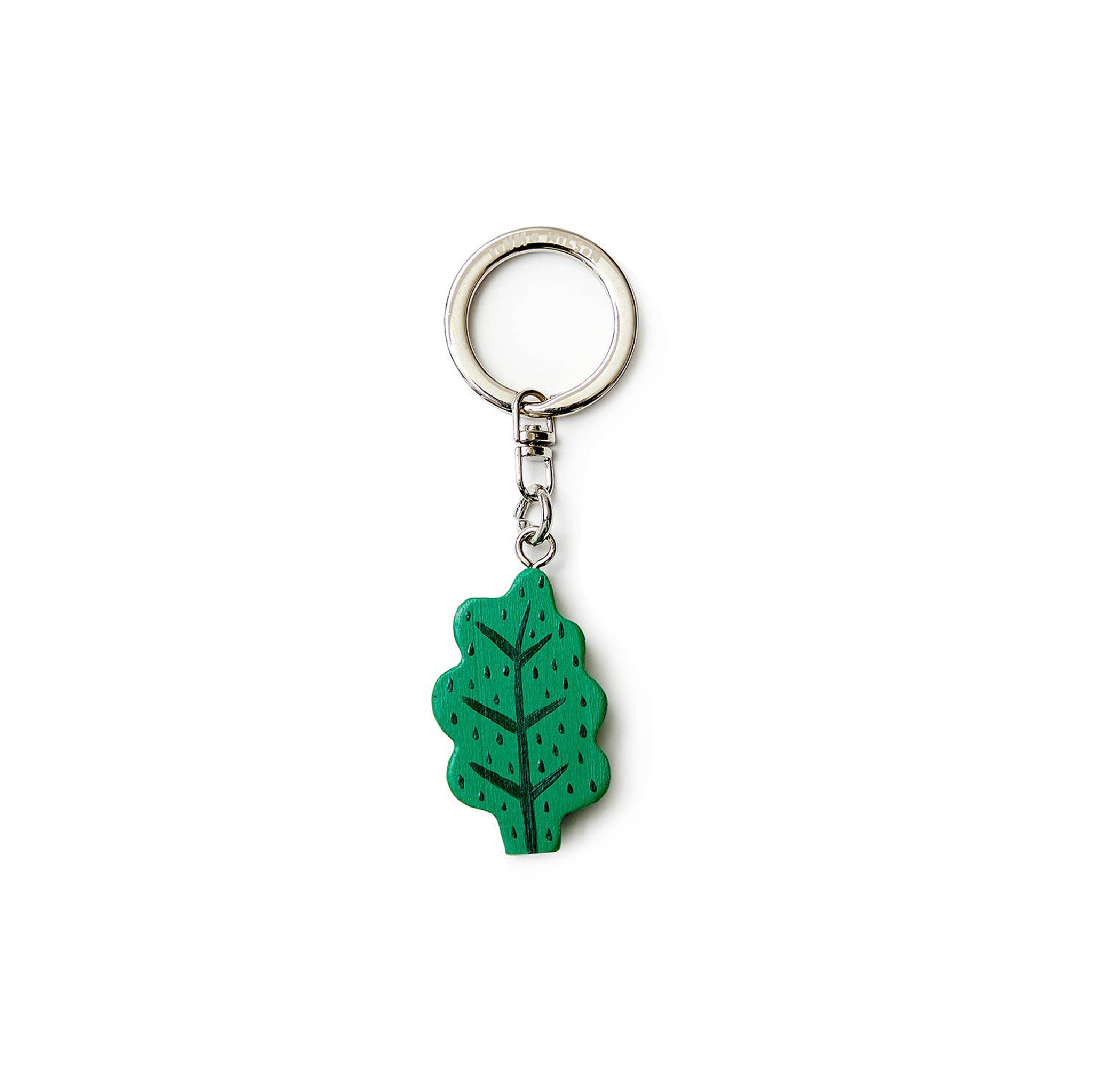 Donna Wilson Leaf Keyring in oak-leaf design, FSC wood charm with sturdy metal ring for keys or bags.