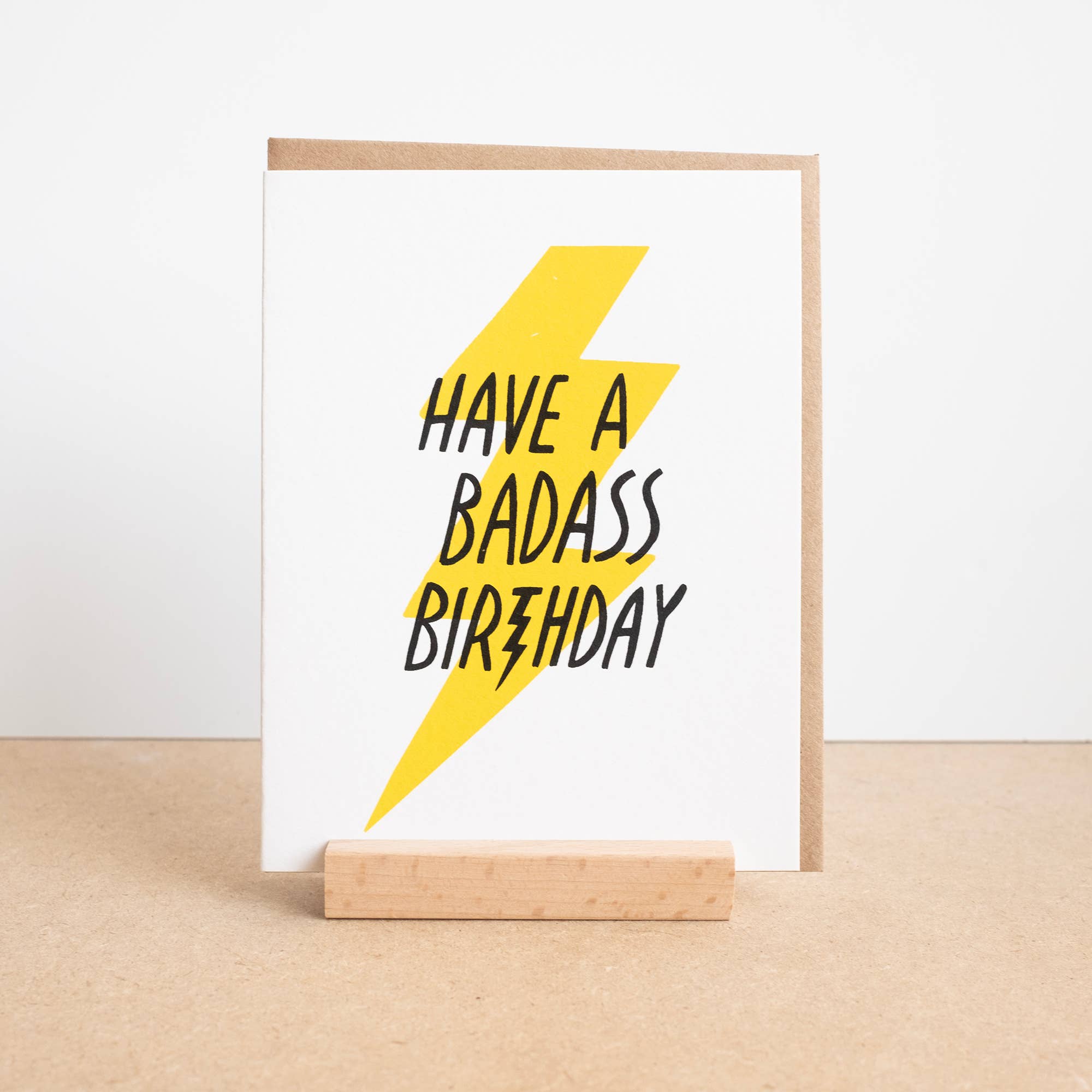 Worthwhile Paper Badass Birthday Card with bold lightning bolt design. Eco-friendly handmade card, A2 size, blank inside, recycled paper envelope.