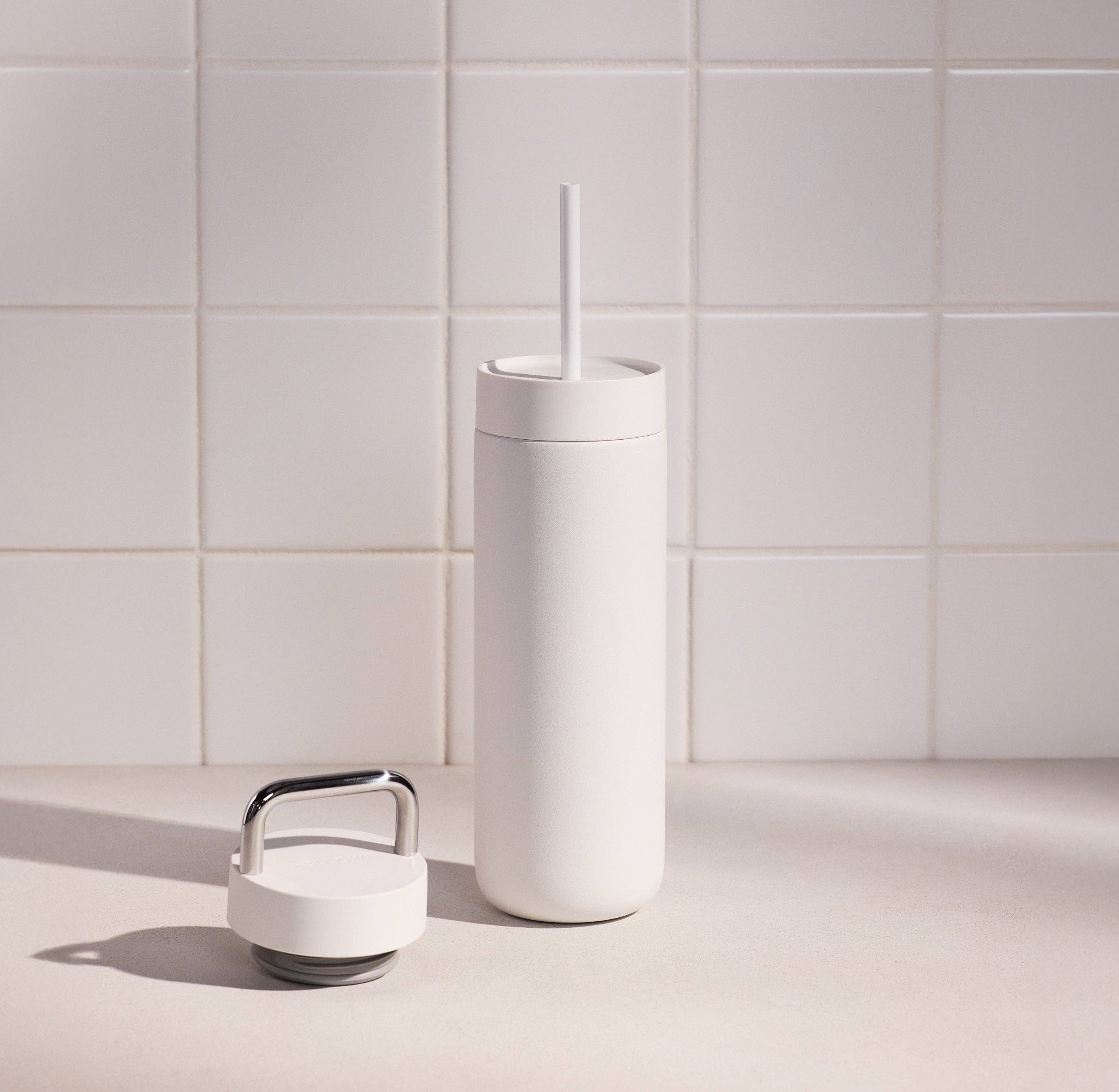 Fellow Carter 2-in-1 Chill Set in matte white, 16 oz insulated tumbler with straw lid and ceramic interior, gift-boxed.