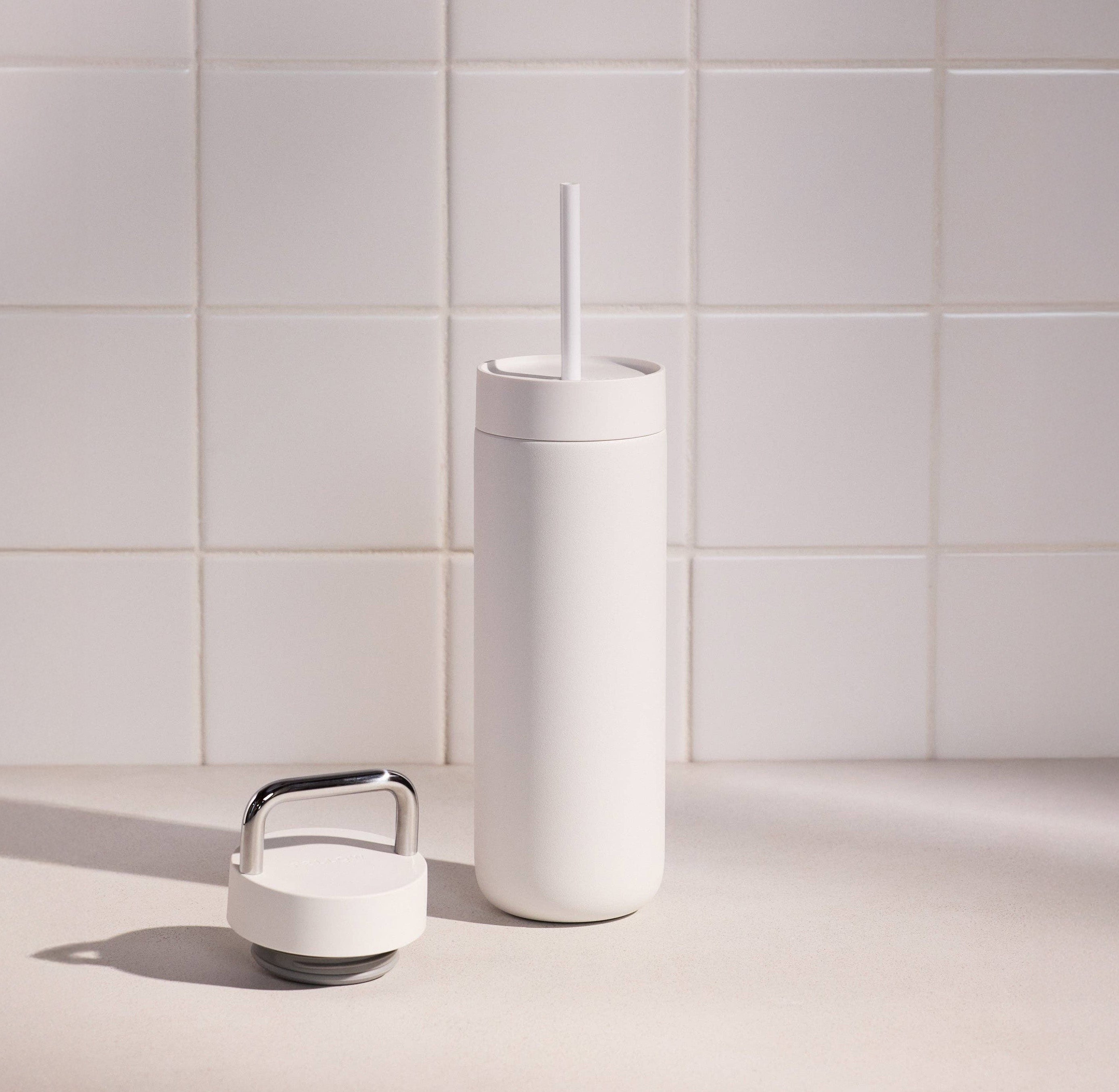 Fellow Carter 2-in-1 Chill Set in matte white, 16 oz insulated tumbler with straw lid and ceramic interior, gift-boxed.