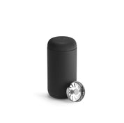 Fellow Carter Move Mug in matte stainless steel with ceramic-coated interior and splash-guard lid.