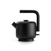 Fellow Clyde Electric Kettle in matte black stainless steel with wide mesh spout and silicone handle.