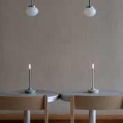 Graypants Wick Portable Rechargeable Candle Lamp in plated aluminum with warm white LED glow. Cordless, USB-C rechargeable, gift pack included.