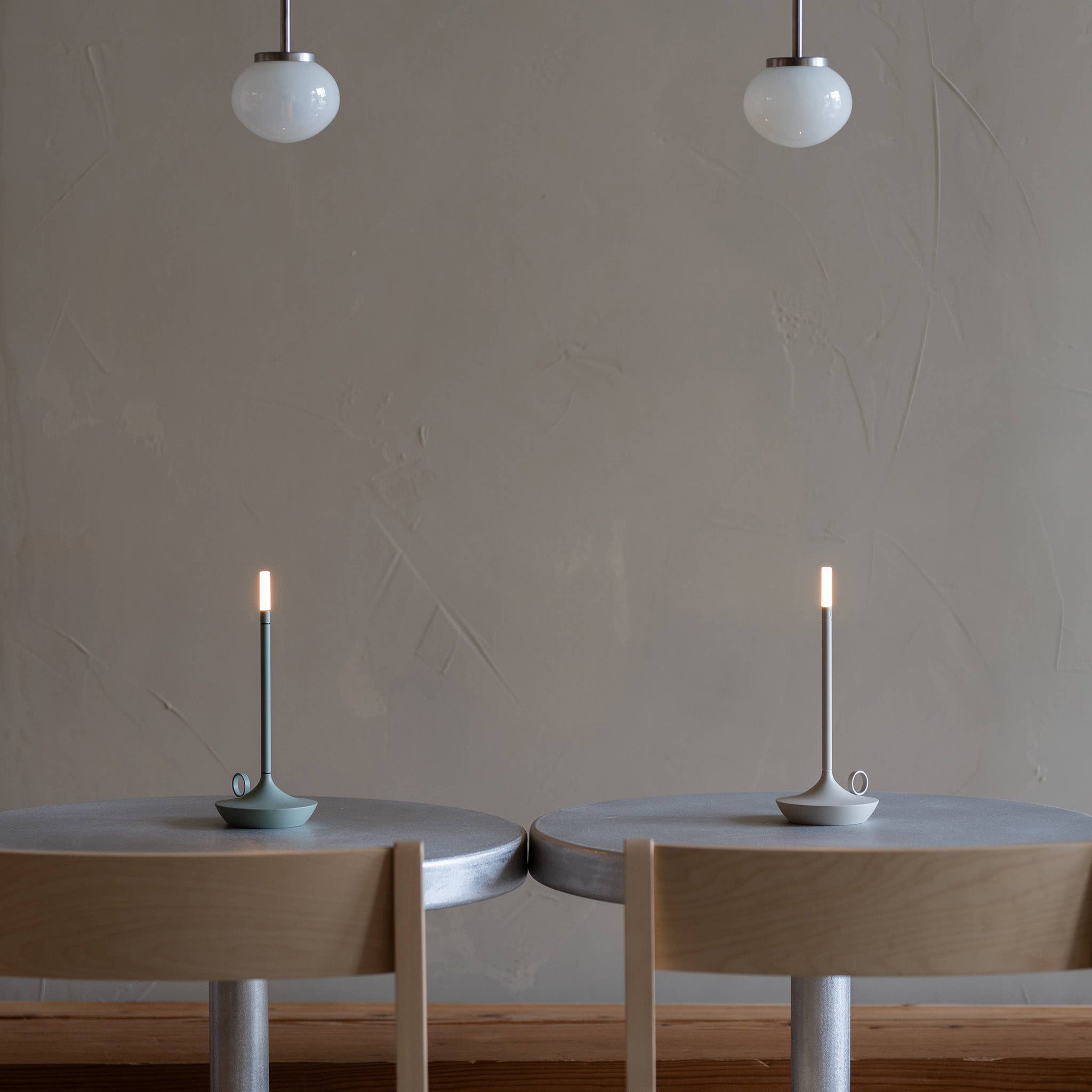 Graypants Wick Portable Rechargeable Candle Lamp in plated aluminum with warm white LED glow. Cordless, USB-C rechargeable, gift pack included.