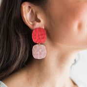 Handmade porcelain poppy red and lilac soft square earrings by Jenna Vanden Brink, bold color-blocked statement studs with hypoallergenic backs.