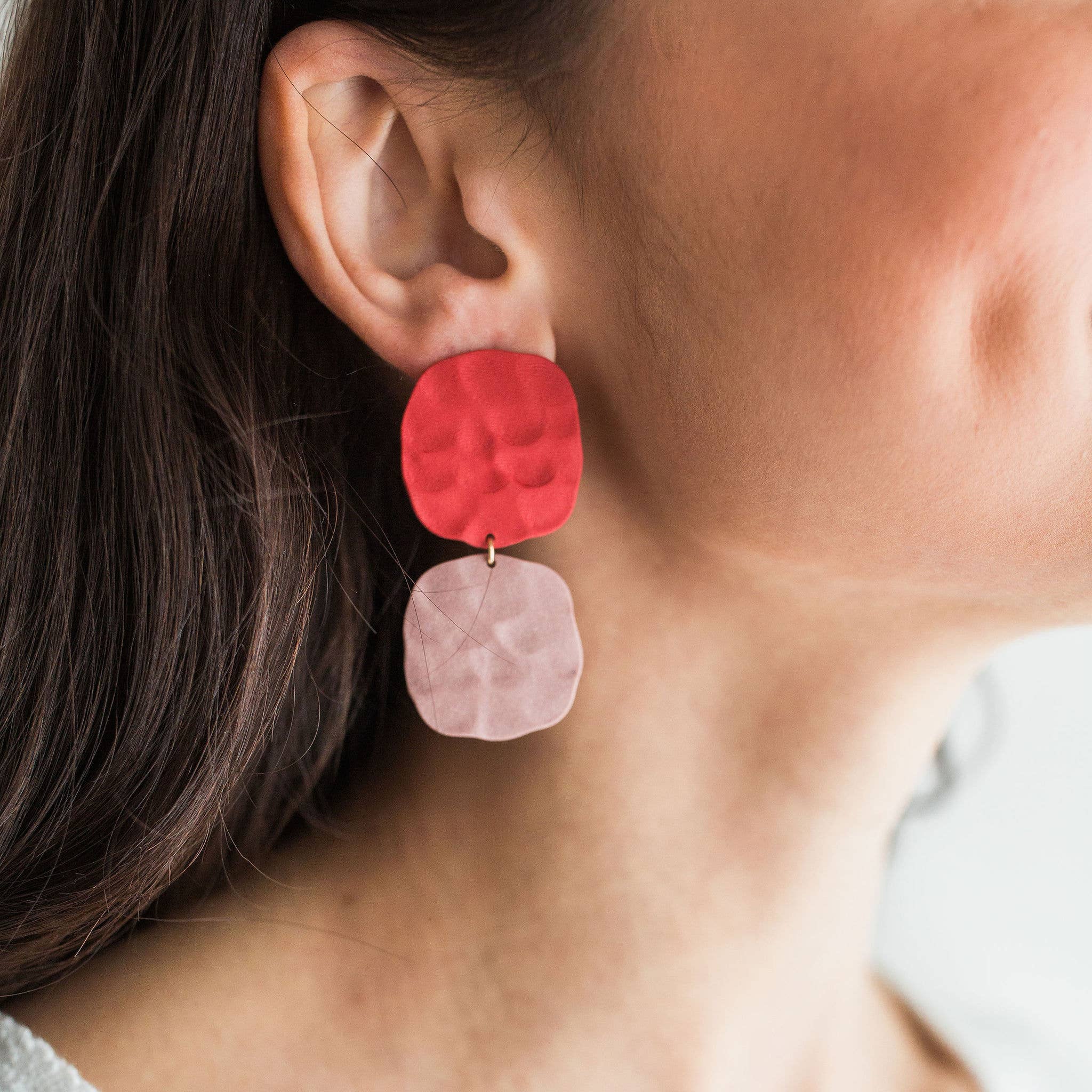 Handmade porcelain poppy red and lilac soft square earrings by Jenna Vanden Brink, bold color-blocked statement studs with hypoallergenic backs.