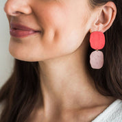 Handmade porcelain poppy red and lilac soft square earrings by Jenna Vanden Brink, bold color-blocked statement studs with hypoallergenic backs.