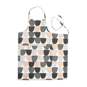 Pink, black, and white graphic-pattern linen-cotton apron by Hanna Konola.