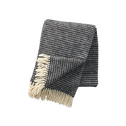 Klippan Yllefabrik Ralph Wool Throw in dark grey organic lamb’s wool, timeless Scandinavian blanket.