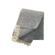 Klippan Yllefabrik Ralph Wool Throw in light grey organic lamb’s wool, timeless Scandinavian blanket.