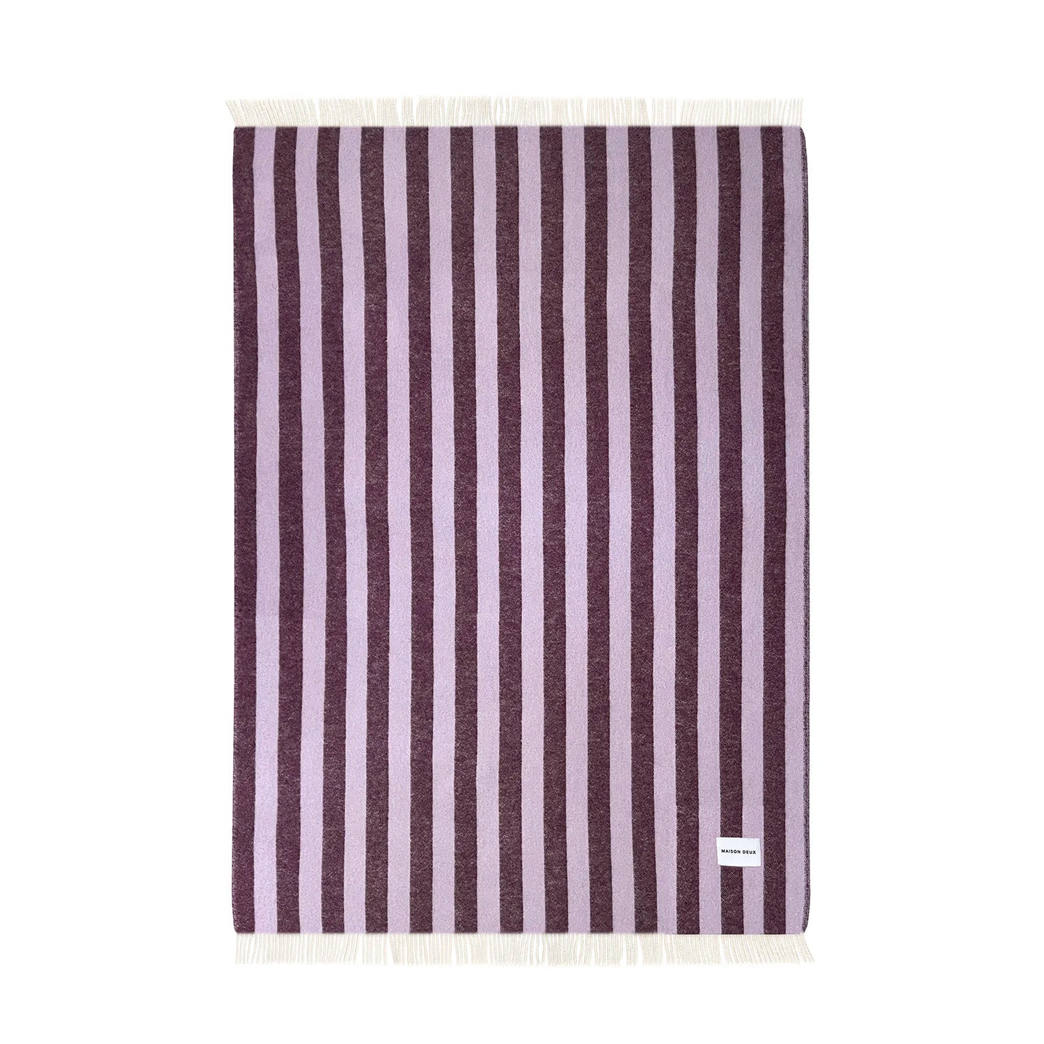 Maison Deux Candy Wrap Blanket in lilac and aubergine lambswool, cheeky reversible candy-stripe throw for sofa or bed.