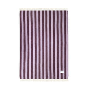Maison Deux Candy Wrap Blanket in lilac and aubergine lambswool, cheeky reversible candy-stripe throw for sofa or bed.