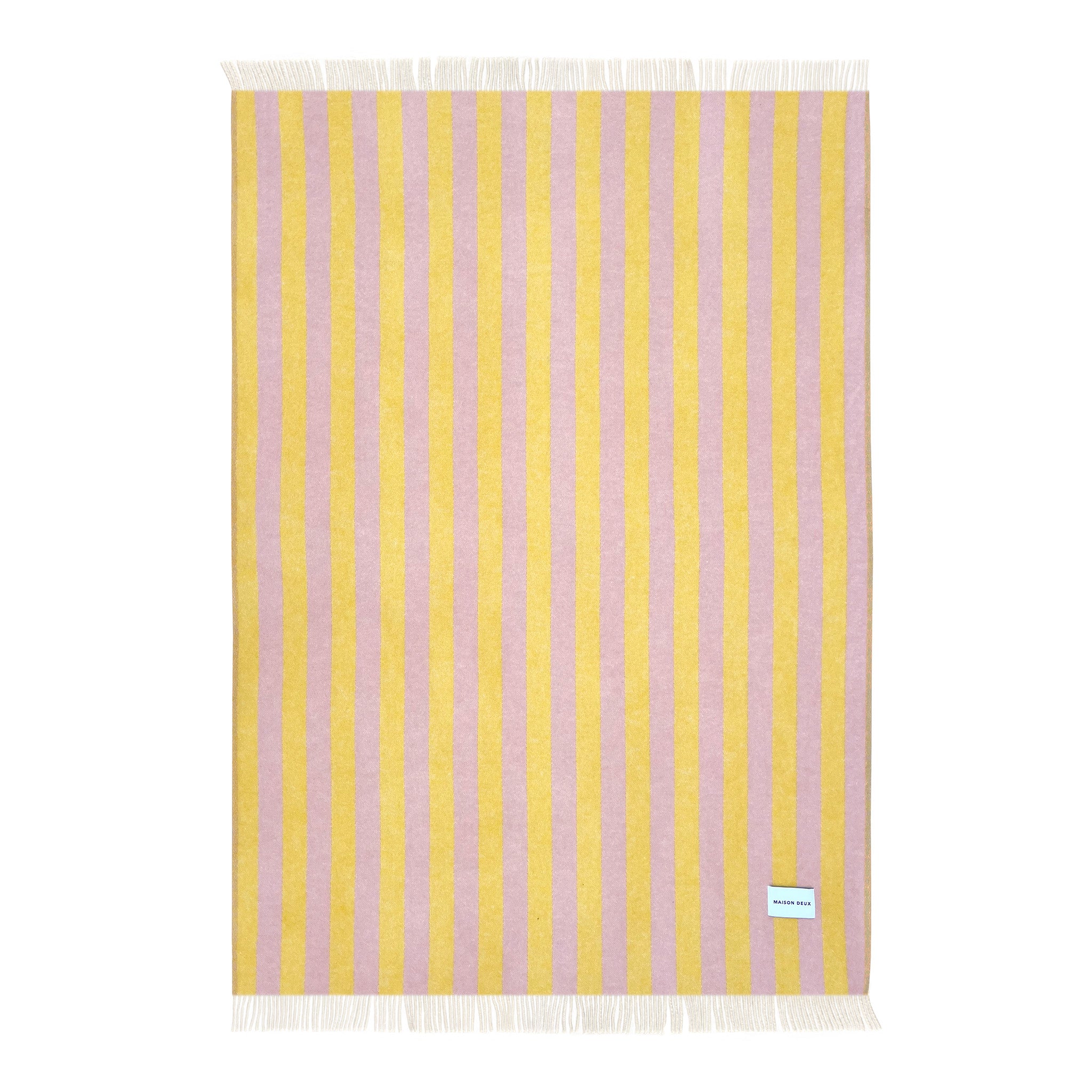 Maison Deux Candy Wrap Blanket in pink and yellow lambswool, reversible candy-stripe design, cozy modern throw.