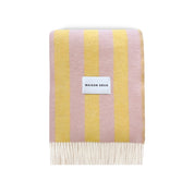 Maison Deux Candy Wrap Blanket in pink and yellow lambswool, reversible candy-stripe design, cozy modern throw.